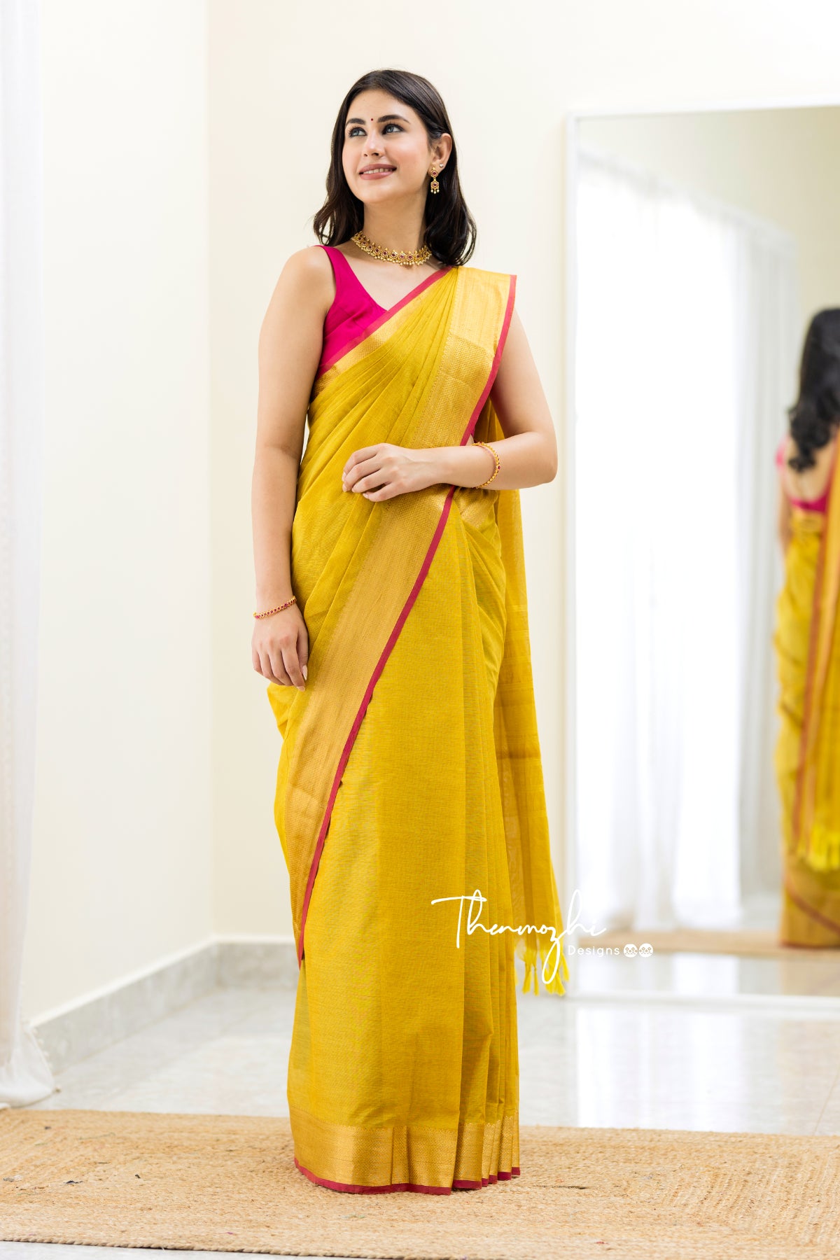 Thenmozhi