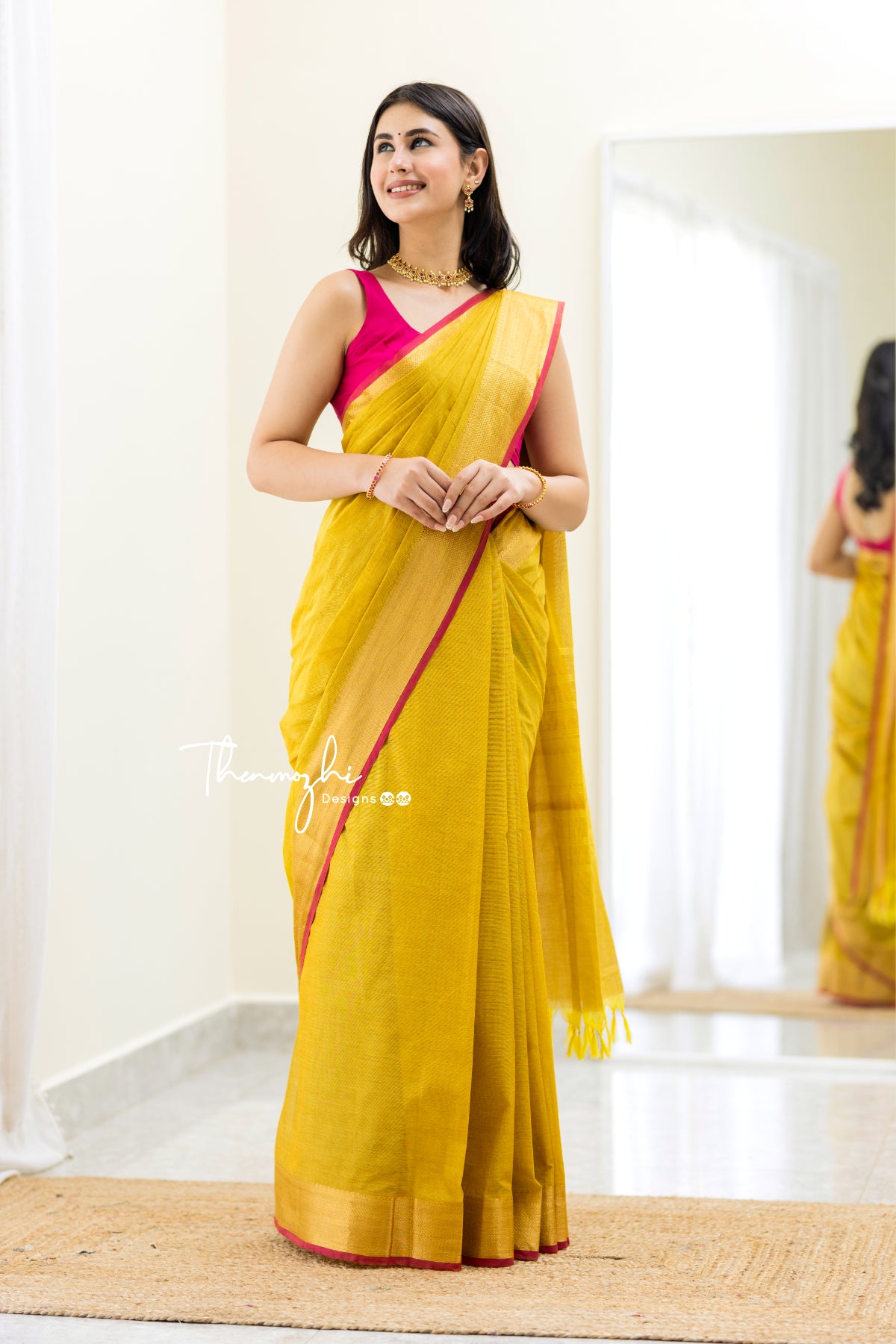 Thenmozhi