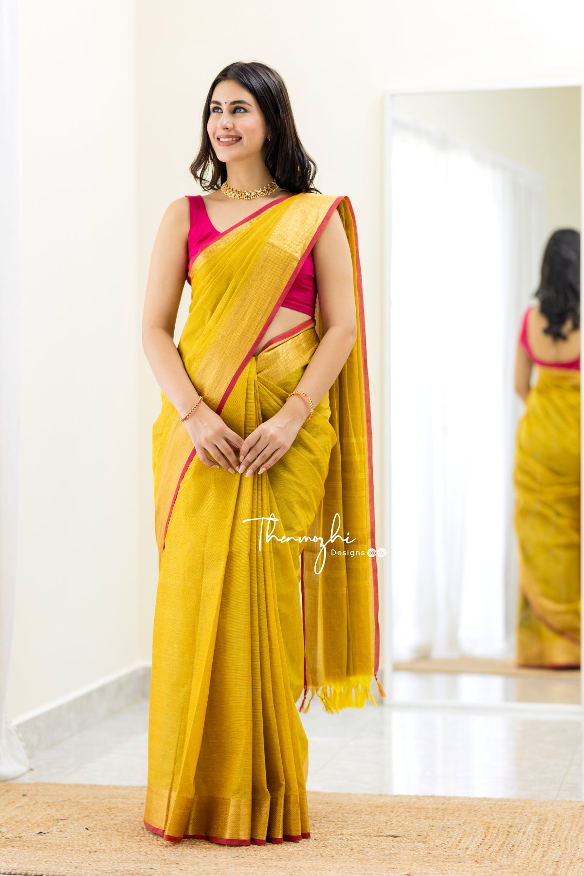 Thenmozhi