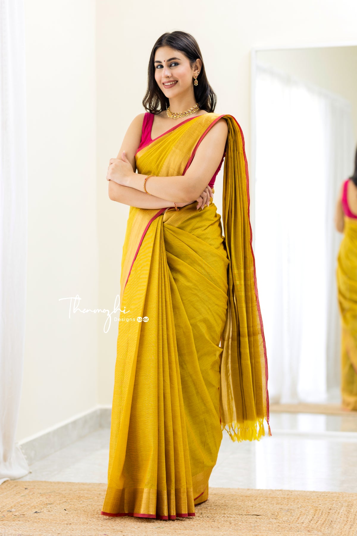 Thenmozhi