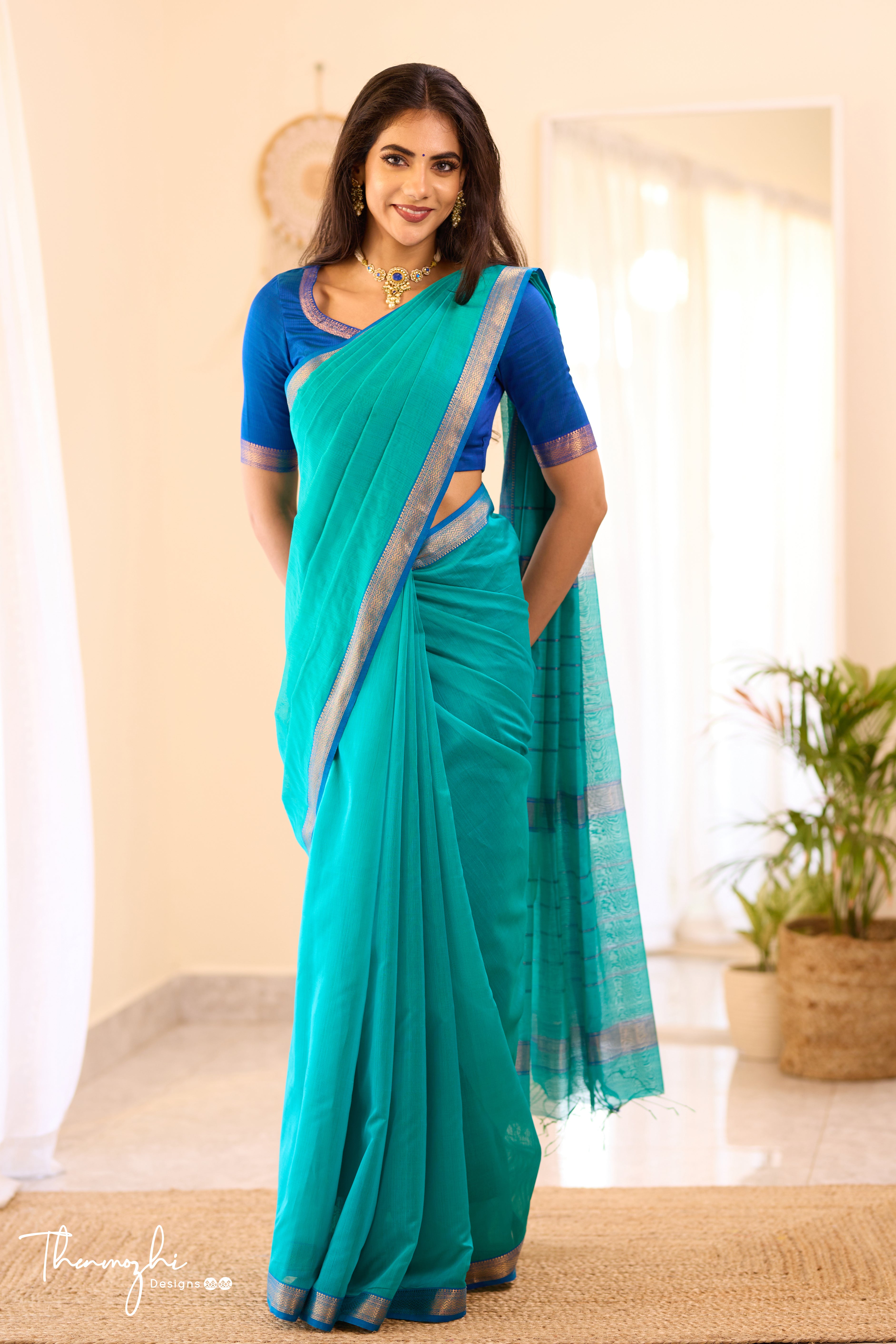 Turquiose Maheshwari Silk Cotton with Blue Small Border