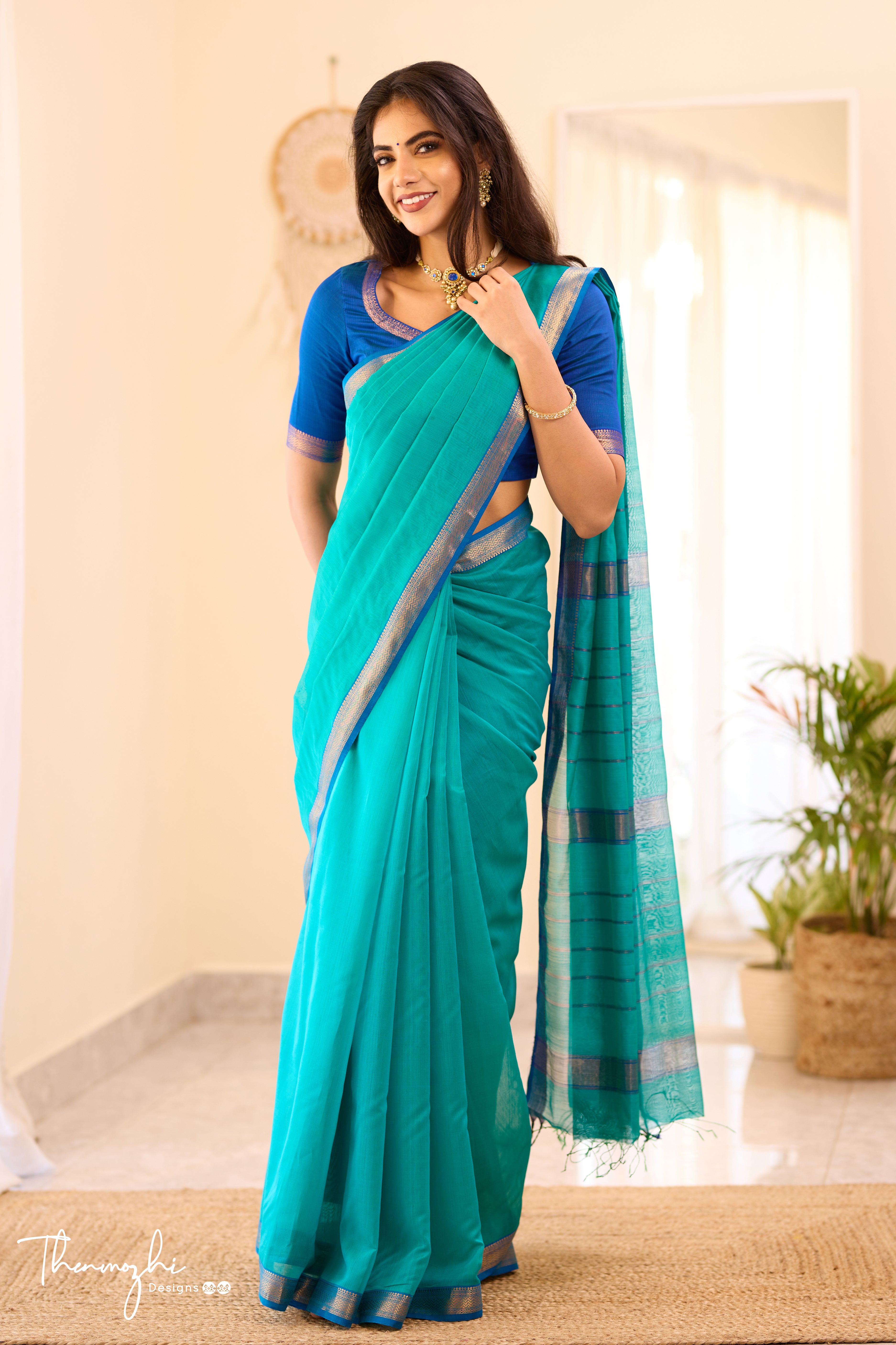 Turquiose Maheshwari Silk Cotton with Blue Small Border