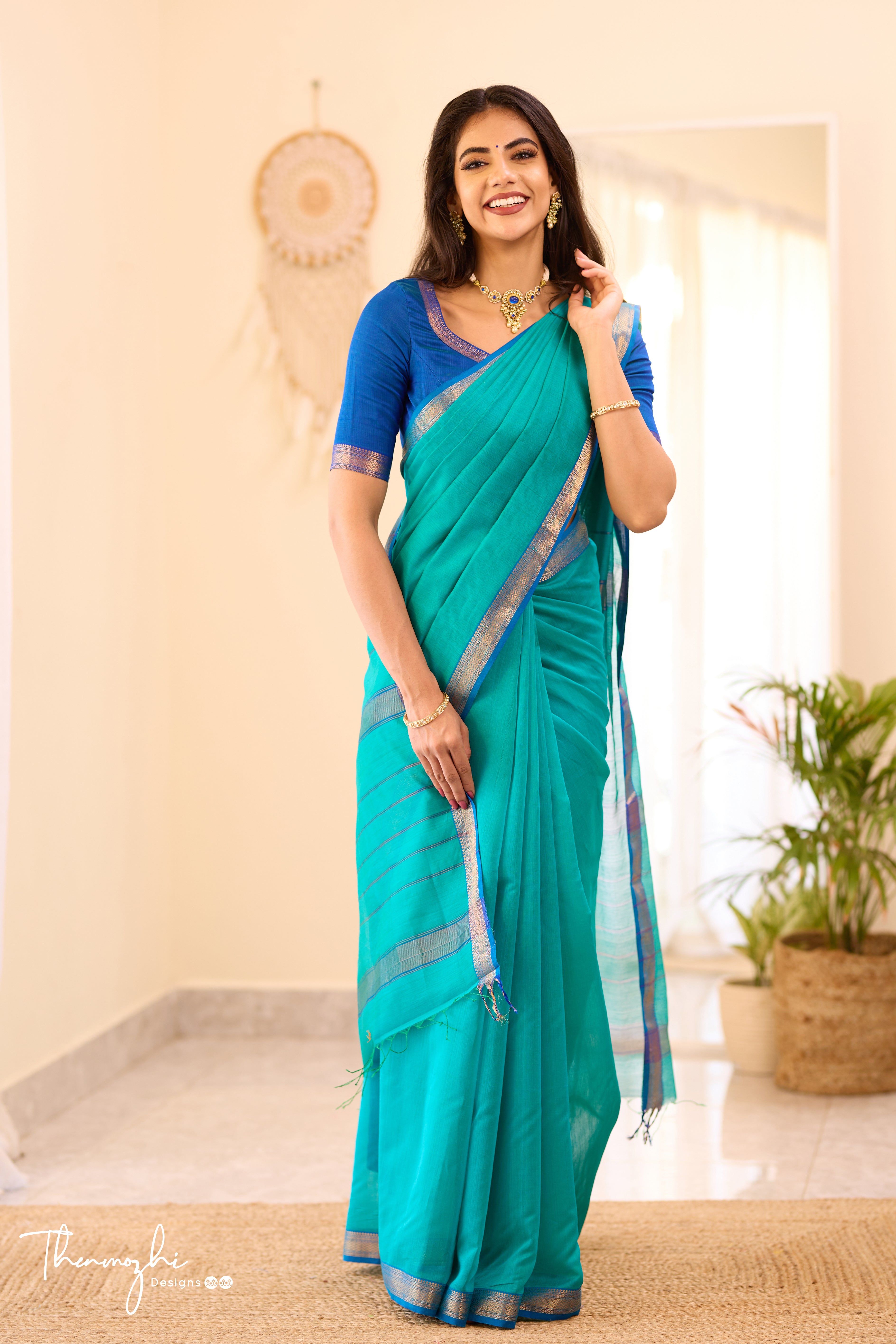 Turquiose Maheshwari Silk Cotton with Blue Small Border