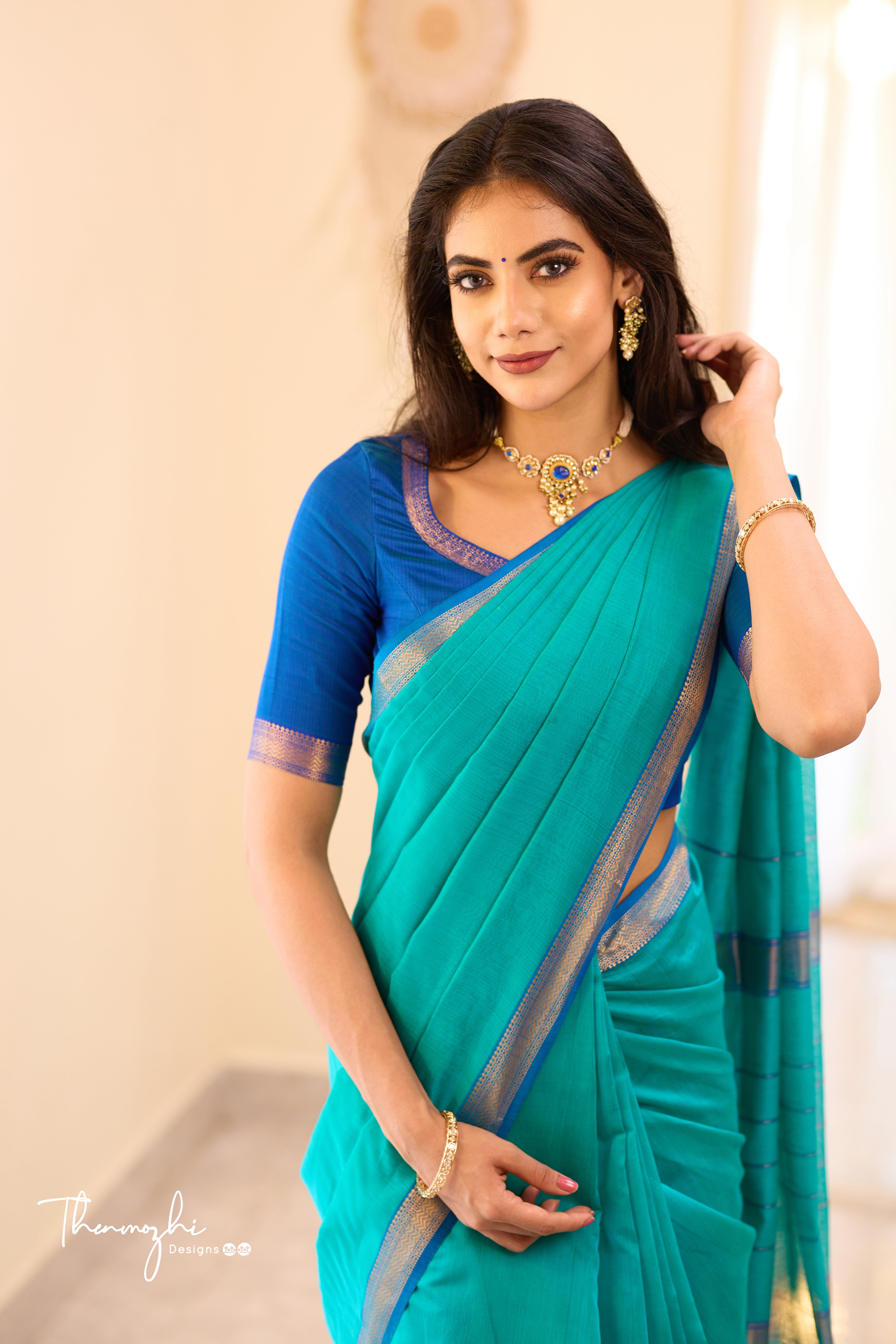 Turquiose Maheshwari Silk Cotton with Blue Small Border
