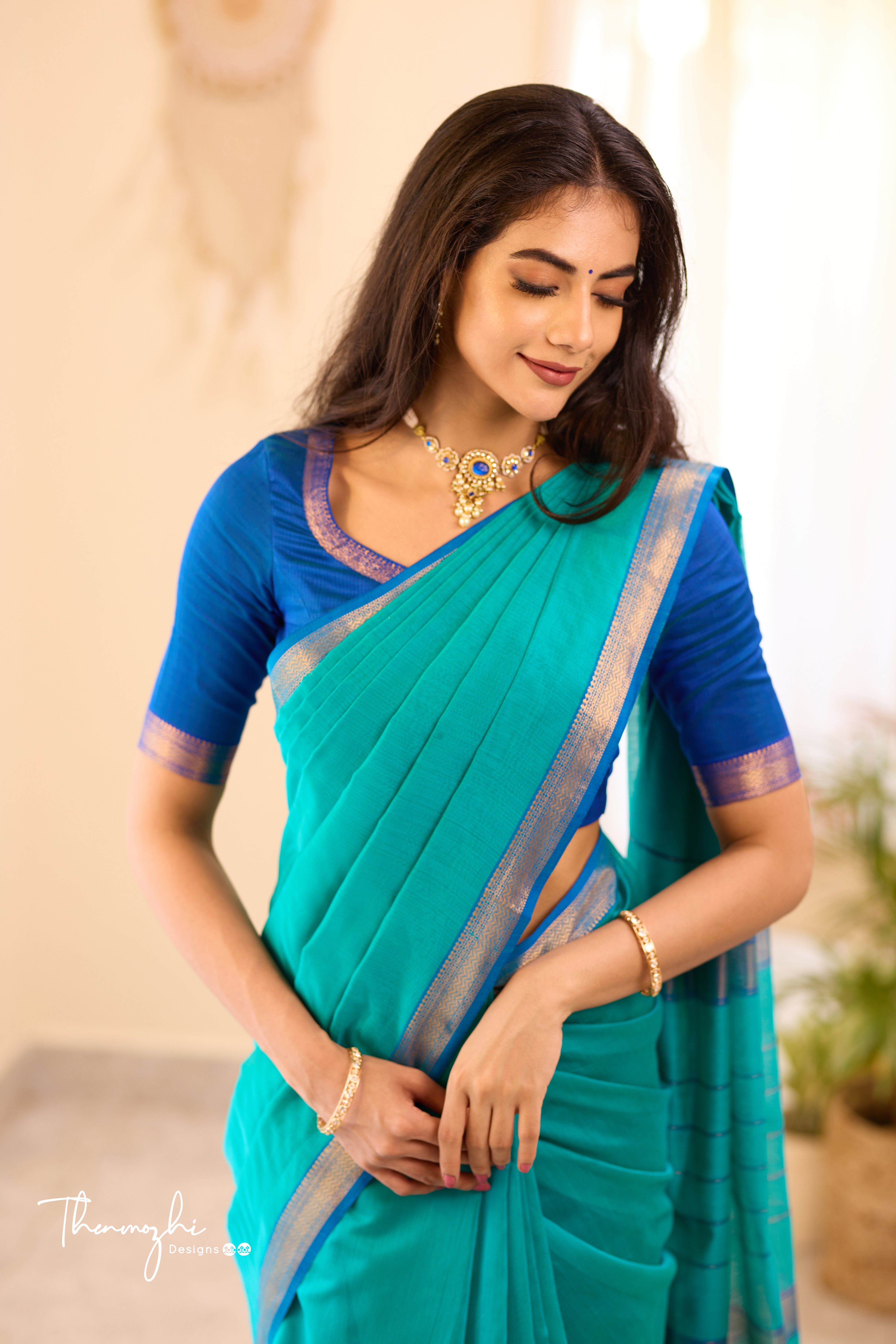 Turquiose Maheshwari Silk Cotton with Blue Small Border