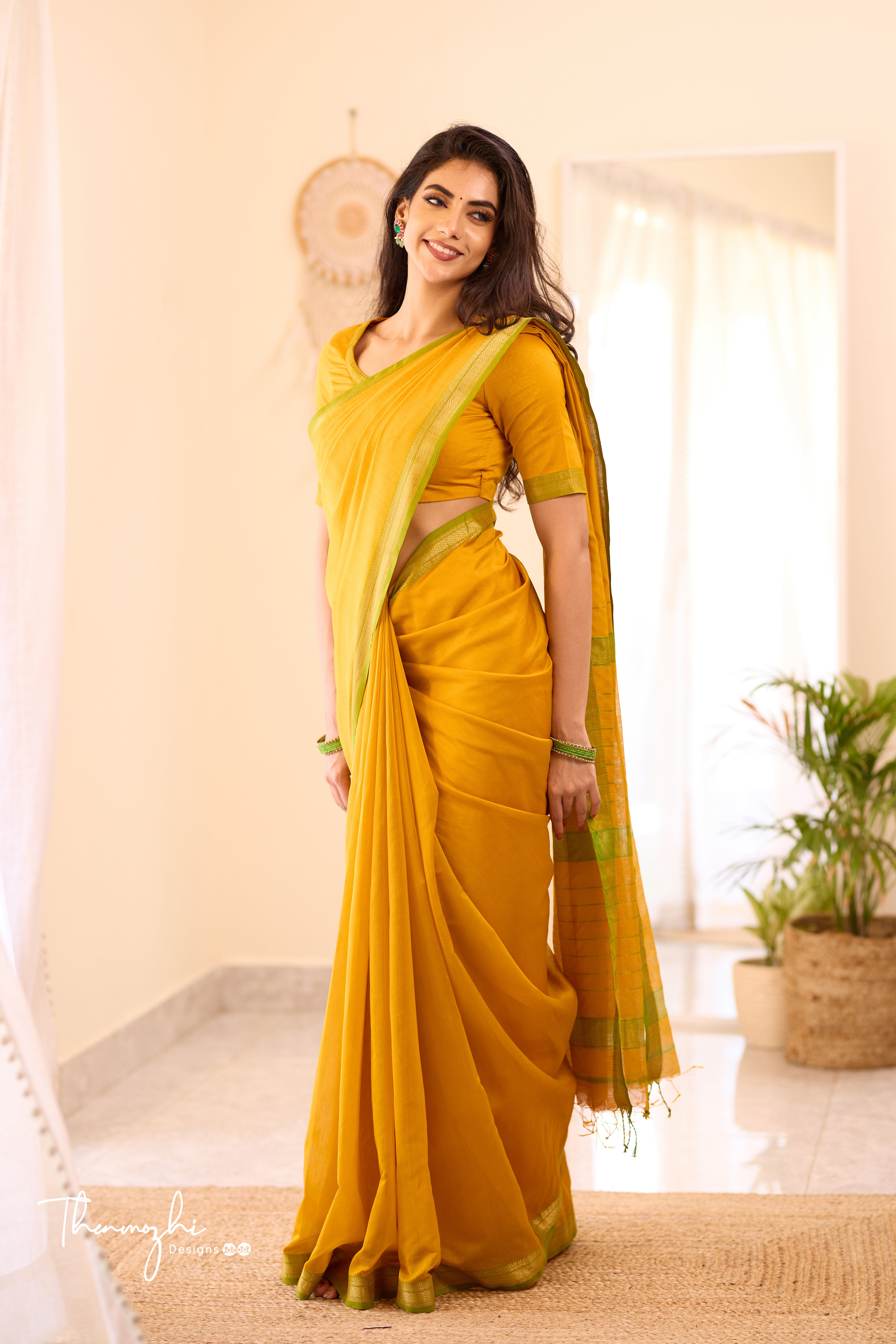 Yellow Maheshwari Silk Cotton with Green Small Border Saree