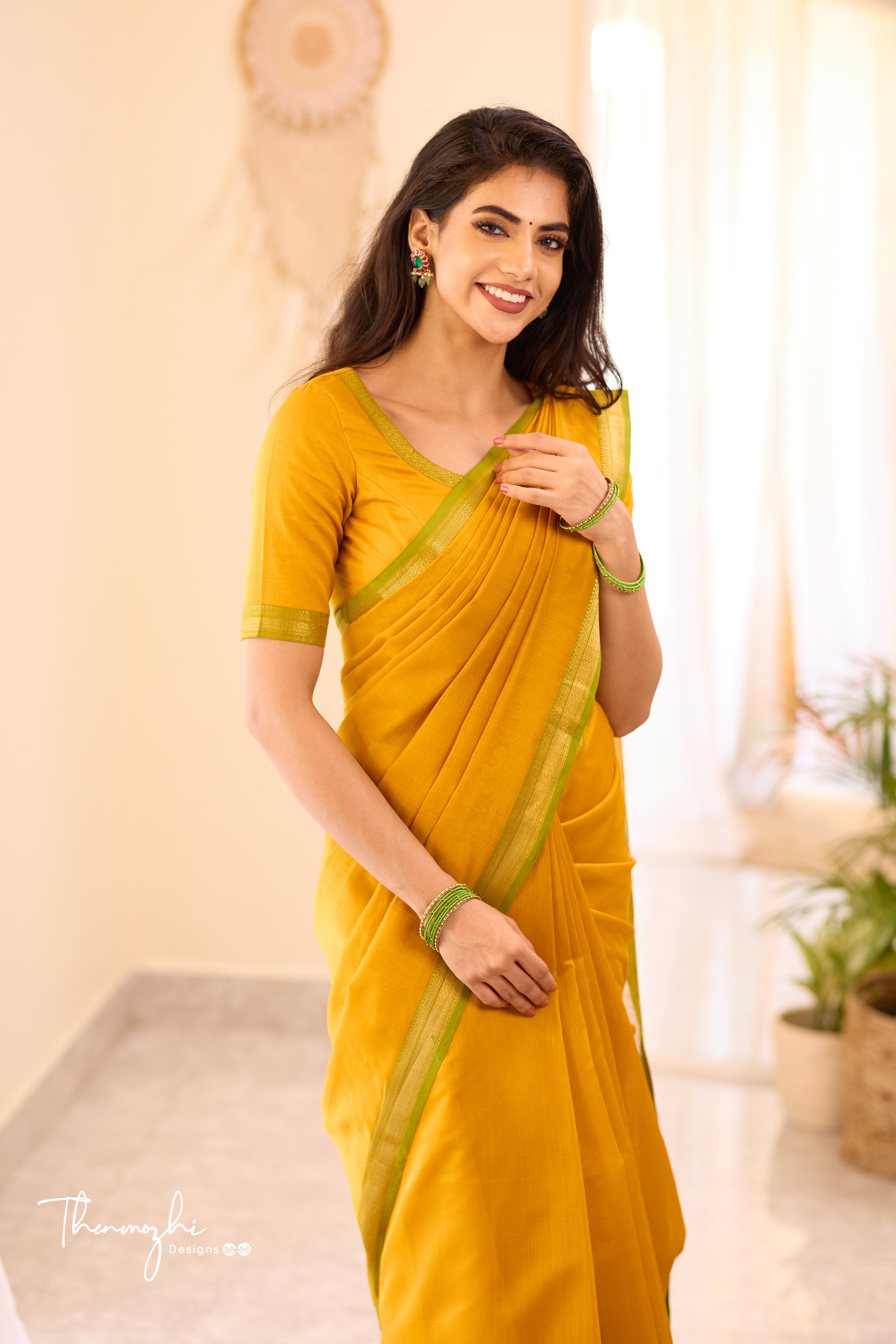 Yellow Maheshwari Silk Cotton with Green Small Border Saree