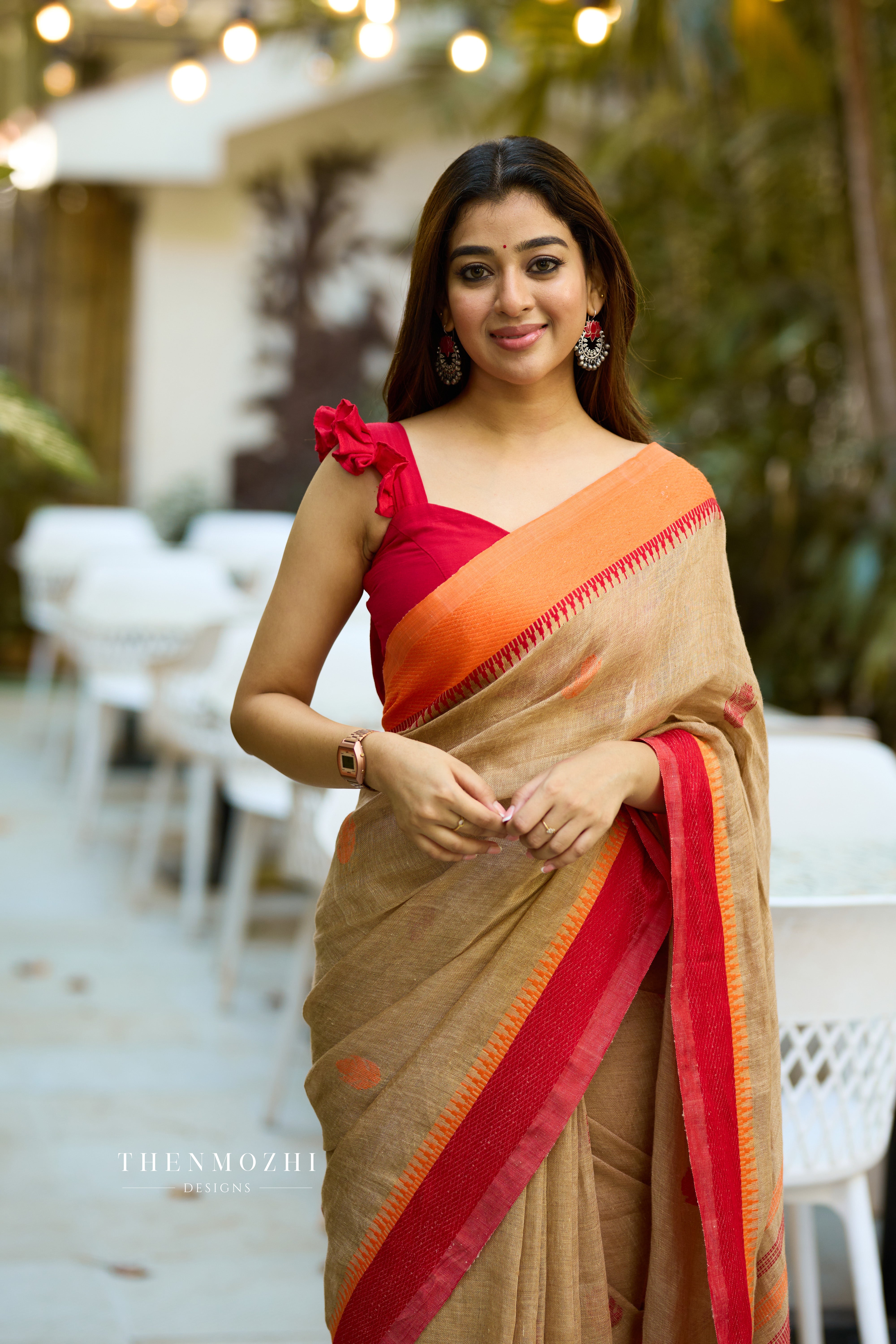 Red Sleeveless Blouse