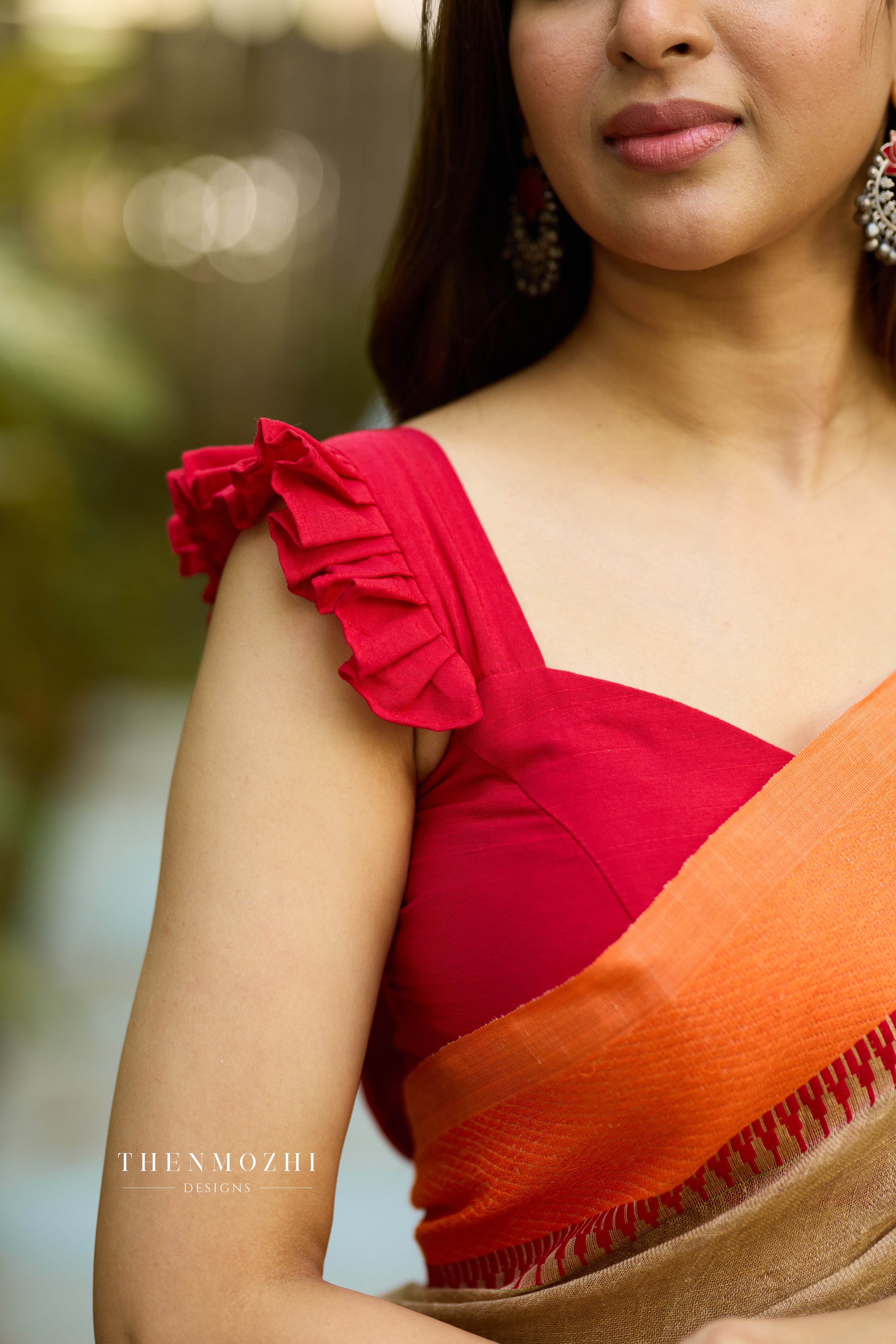 Red Sleeveless Blouse