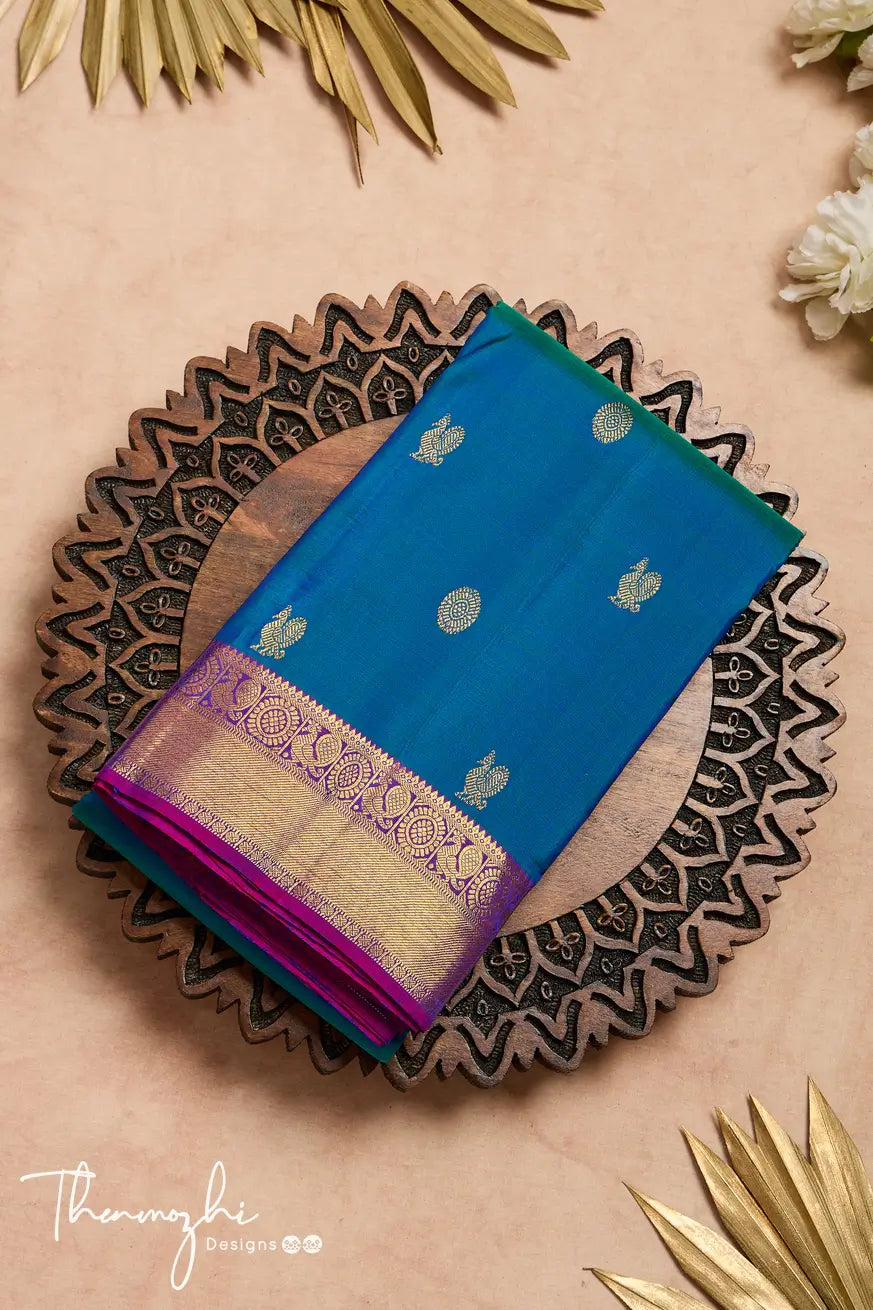 Hand Painted Blue Linen Tissue Silk Saree with Peacock Design – Luxurion  World